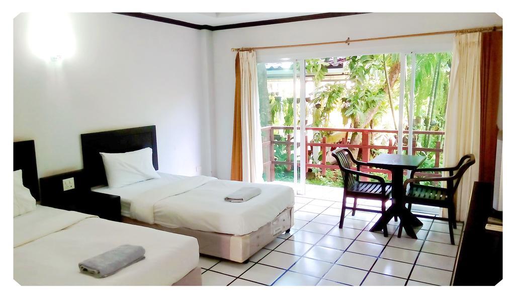 Thong Paeka Hotel Prasat Quarto foto